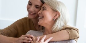 Mom and daughter hugging