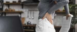 lady suffering from back pain