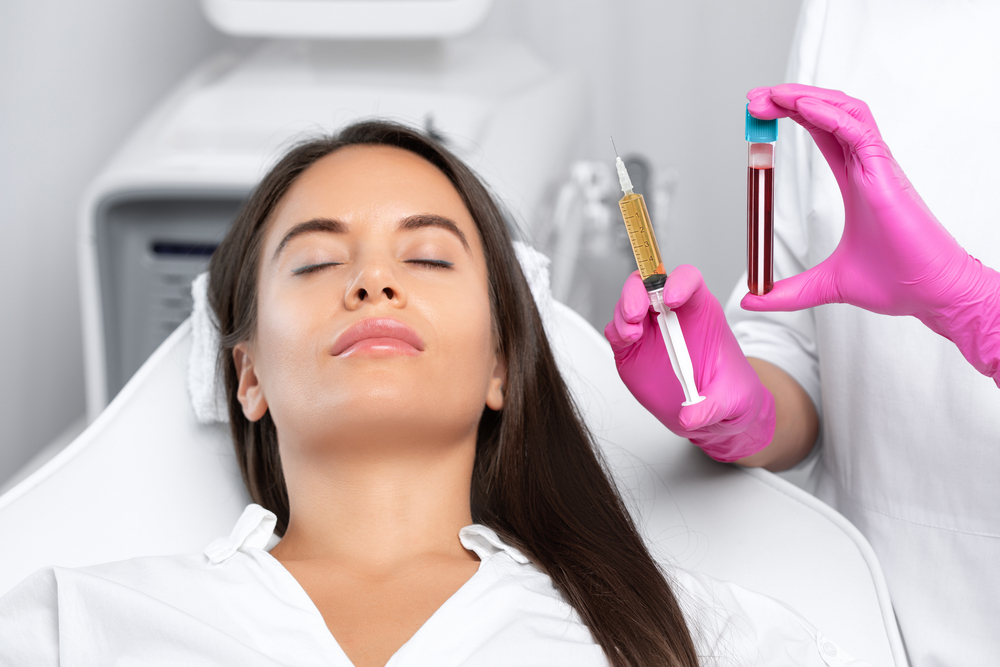 Beautician working with her female patient